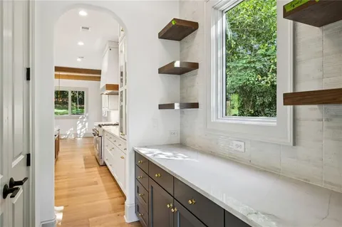 a view of a bathroom from the hallway