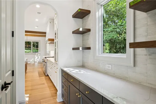 a view of a bathroom from the hallway