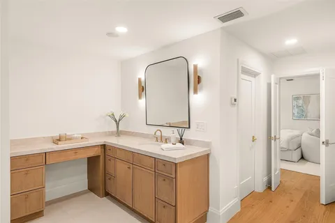 a view of a patio with couches chairs and potted plants