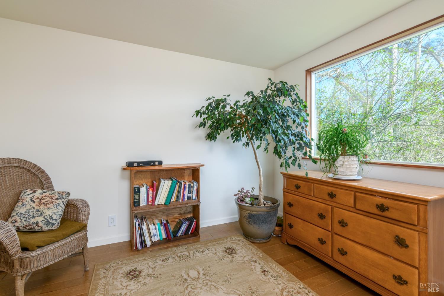 44120 Biaggi Road Manchester, CA 95459 - Photo 12 of 42 a living room with furniture and a potted plant