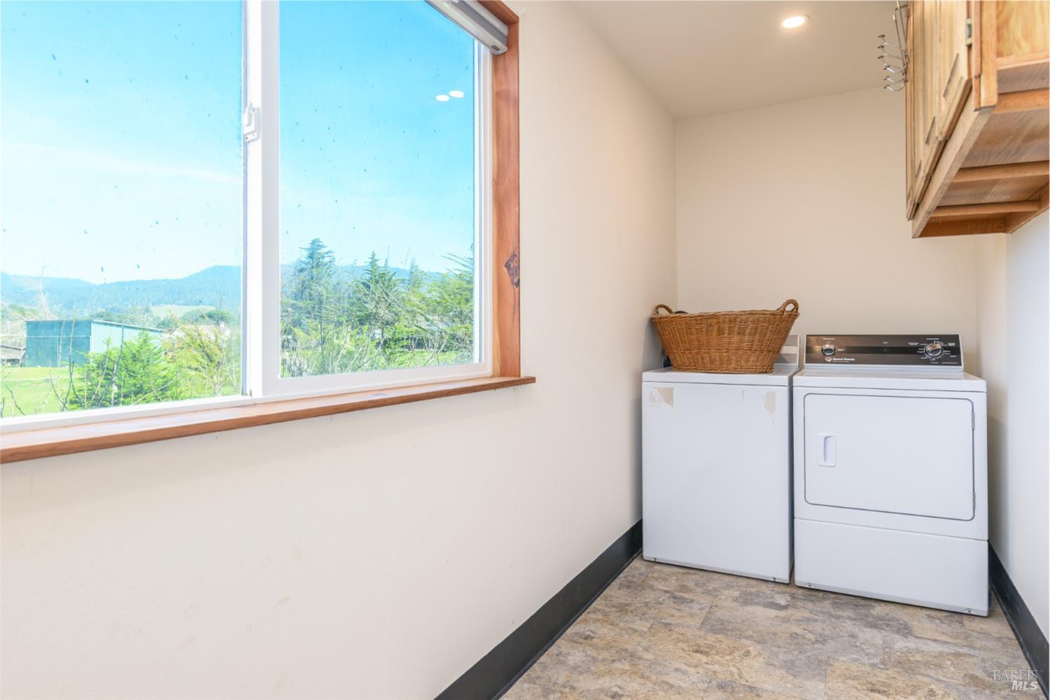 44120 Biaggi Road Manchester, CA 95459 - Photo 16 of 42 a view of storage and utility room with washer and dryer
