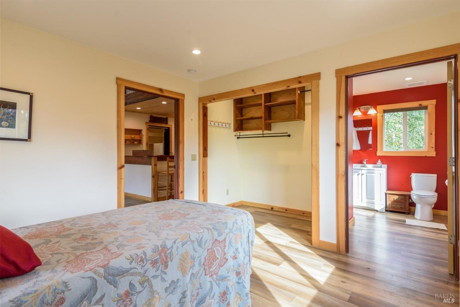 44120 Biaggi Road Manchester, CA 95459 - Photo 33 of 42 a bedroom with a bed and wooden floor