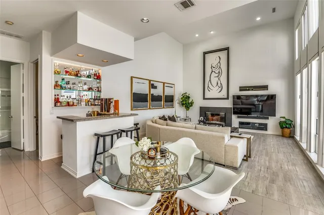 a living room with furniture and flat screen tv