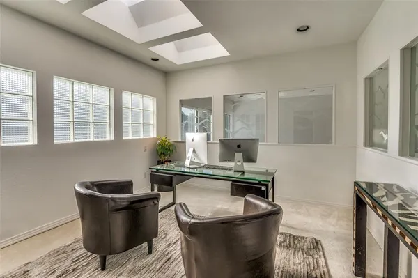 a kitchen with a sink a stove and a wooden cabinets