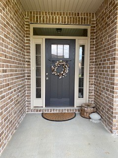 1022 Selous Drive Murfreesboro, TN 37128 - Photo 2 of 29 a view of a house with potted plants and a garage