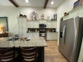1022 Selous Drive Murfreesboro, TN 37128 - Photo 11 of 29 a kitchen with granite countertop a sink appliances and cabinets