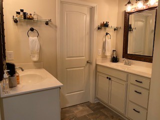 1022 Selous Drive Murfreesboro, TN 37128 - Photo 20 of 29 a bathroom with a sink and a mirror