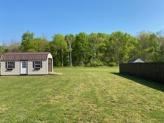1022 Selous Drive Murfreesboro, TN 37128 - Photo 28 of 29 a view of a house with backyard and a tree