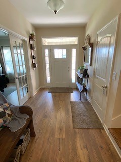 1022 Selous Drive Murfreesboro, TN 37128 - Photo 5 of 29 a view of a livingroom with furniture hardwood floor and a living room
