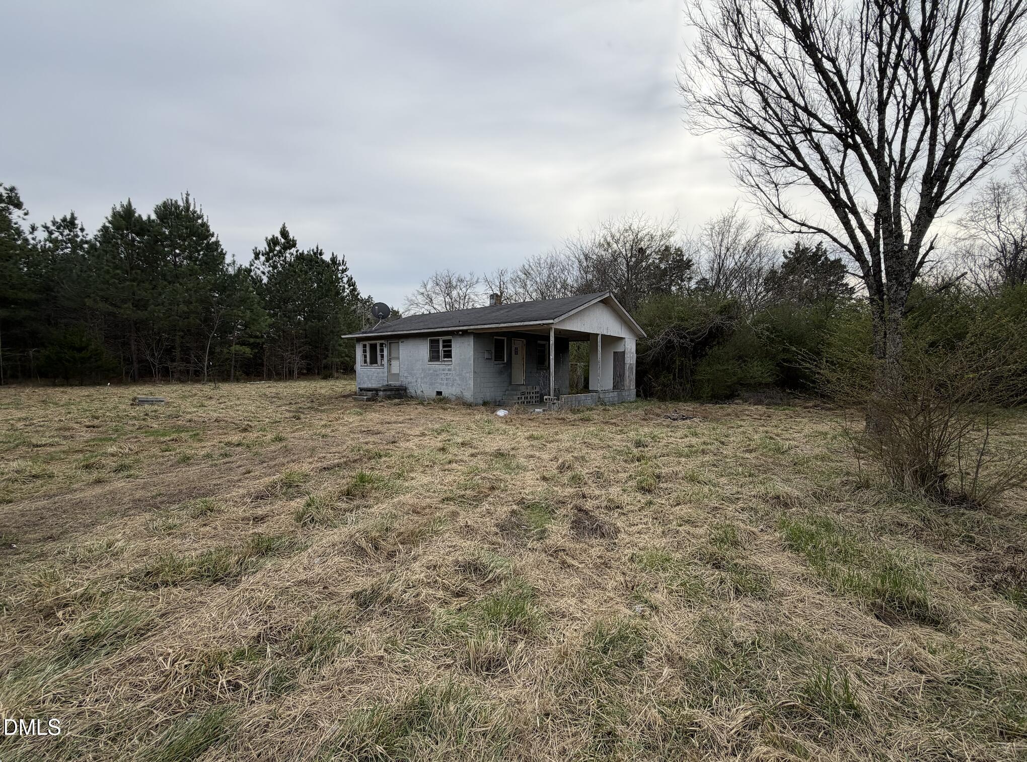 3211 Woodsdale Road Roxboro, NC 27574 - Photo 5 of 5 a front view of house with yard and trees