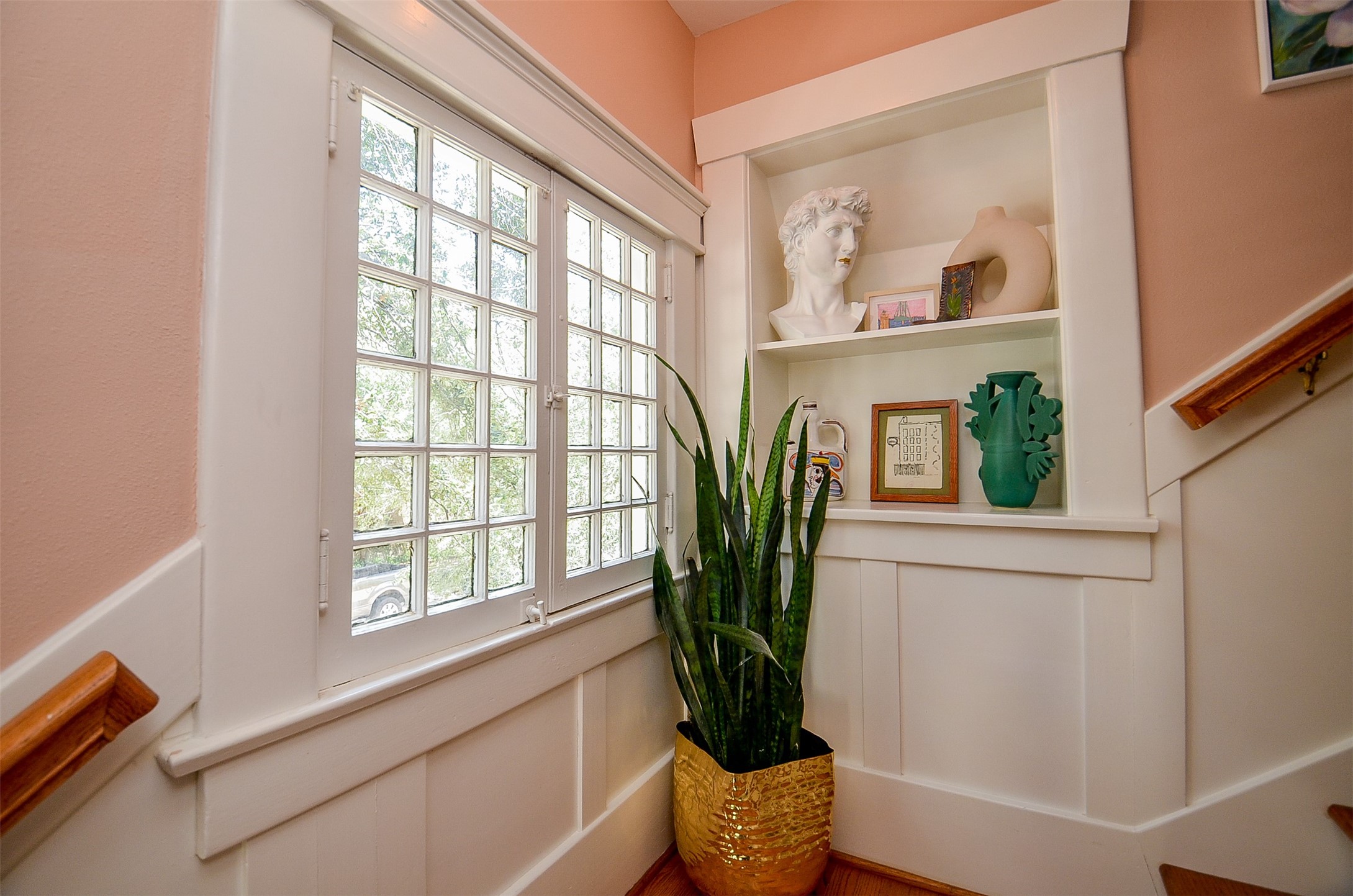 816 West Main Street Houston, TX 77006 - Photo 14 of 48 a view of entryway with wooden floor and a potted plant