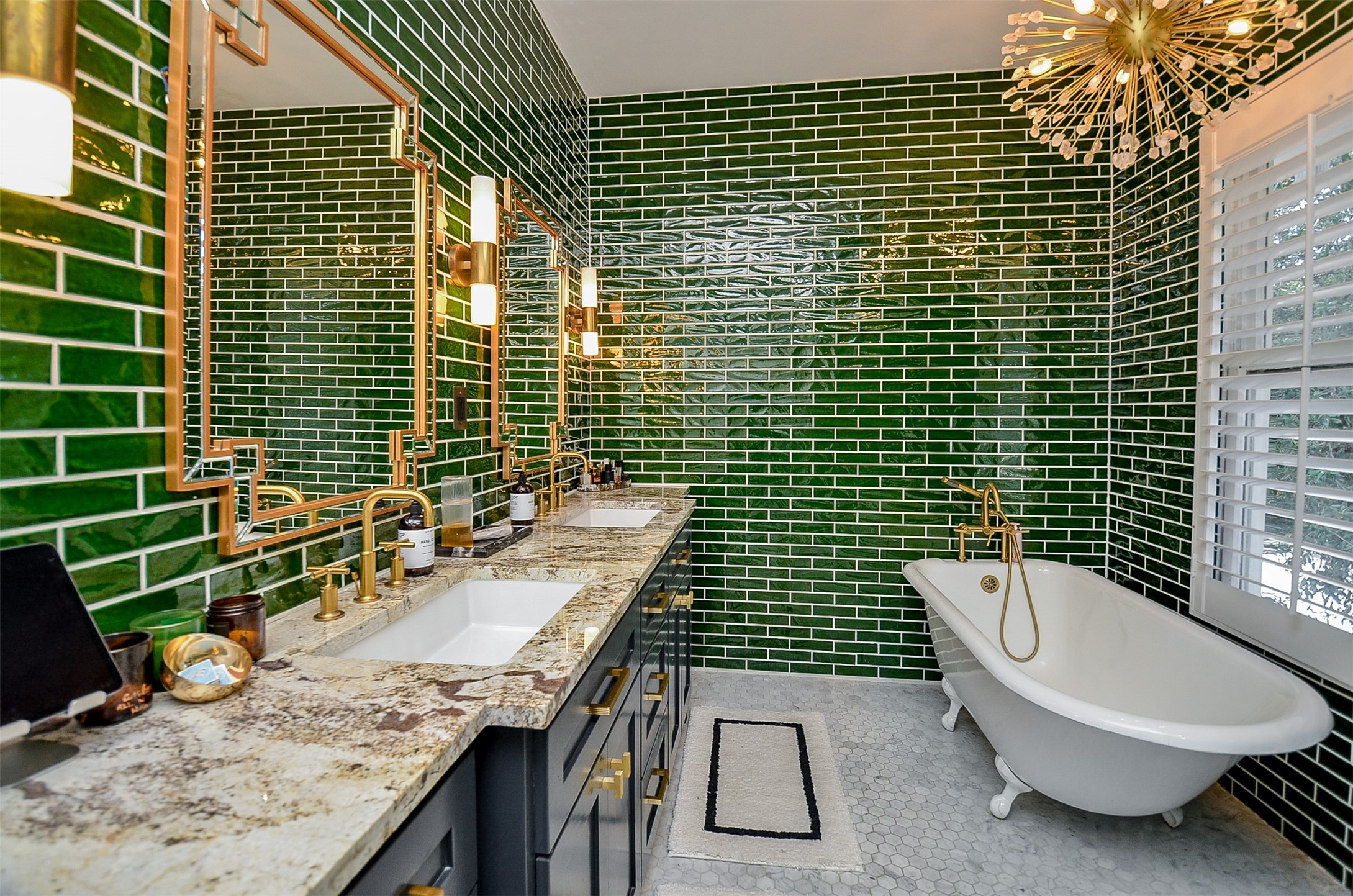 816 West Main Street Houston, TX 77006 - Photo 19 of 48 a bathroom with a sink a toilet and mirror