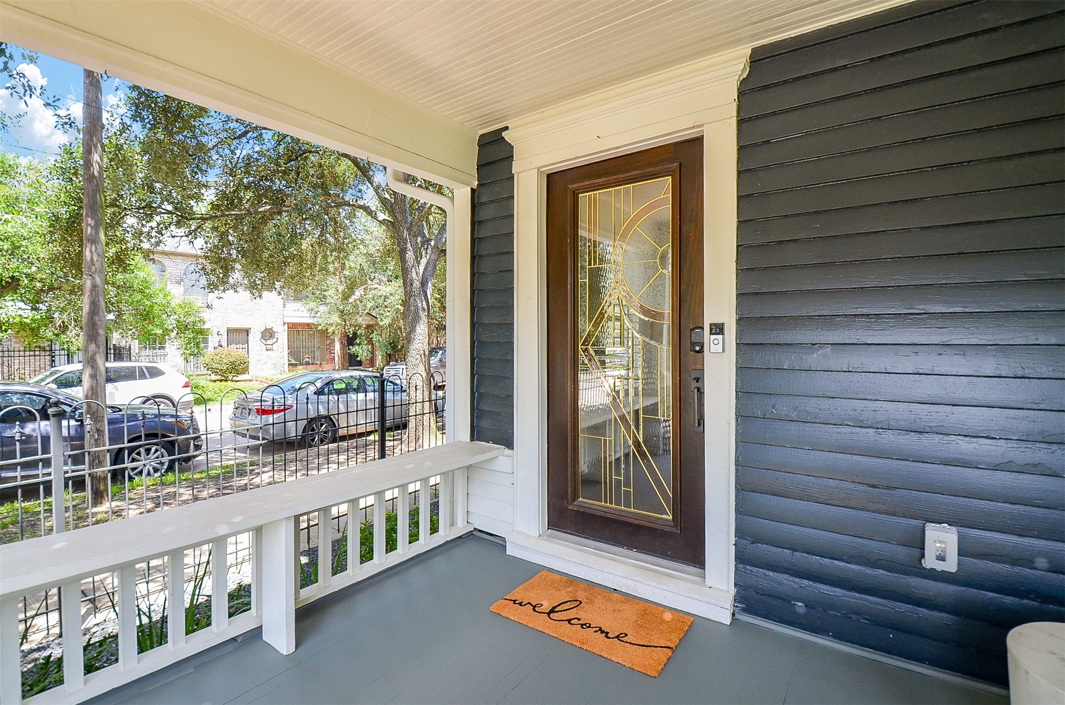 816 West Main Street Houston, TX 77006 - Photo 2 of 48 a view of front door and deck with wooden floor