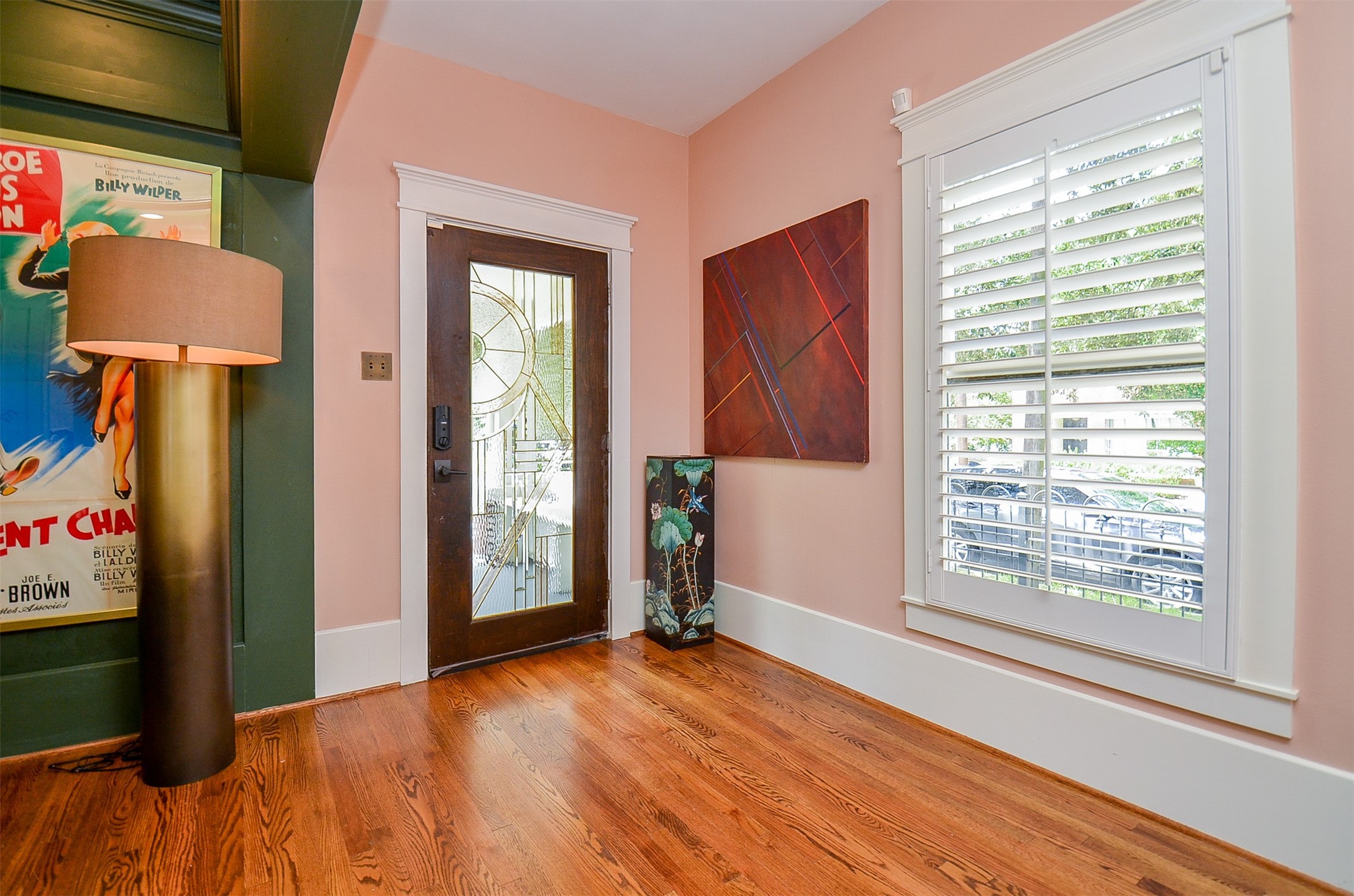816 West Main Street Houston, TX 77006 - Photo 3 of 48 wooden floor in an empty room with a window