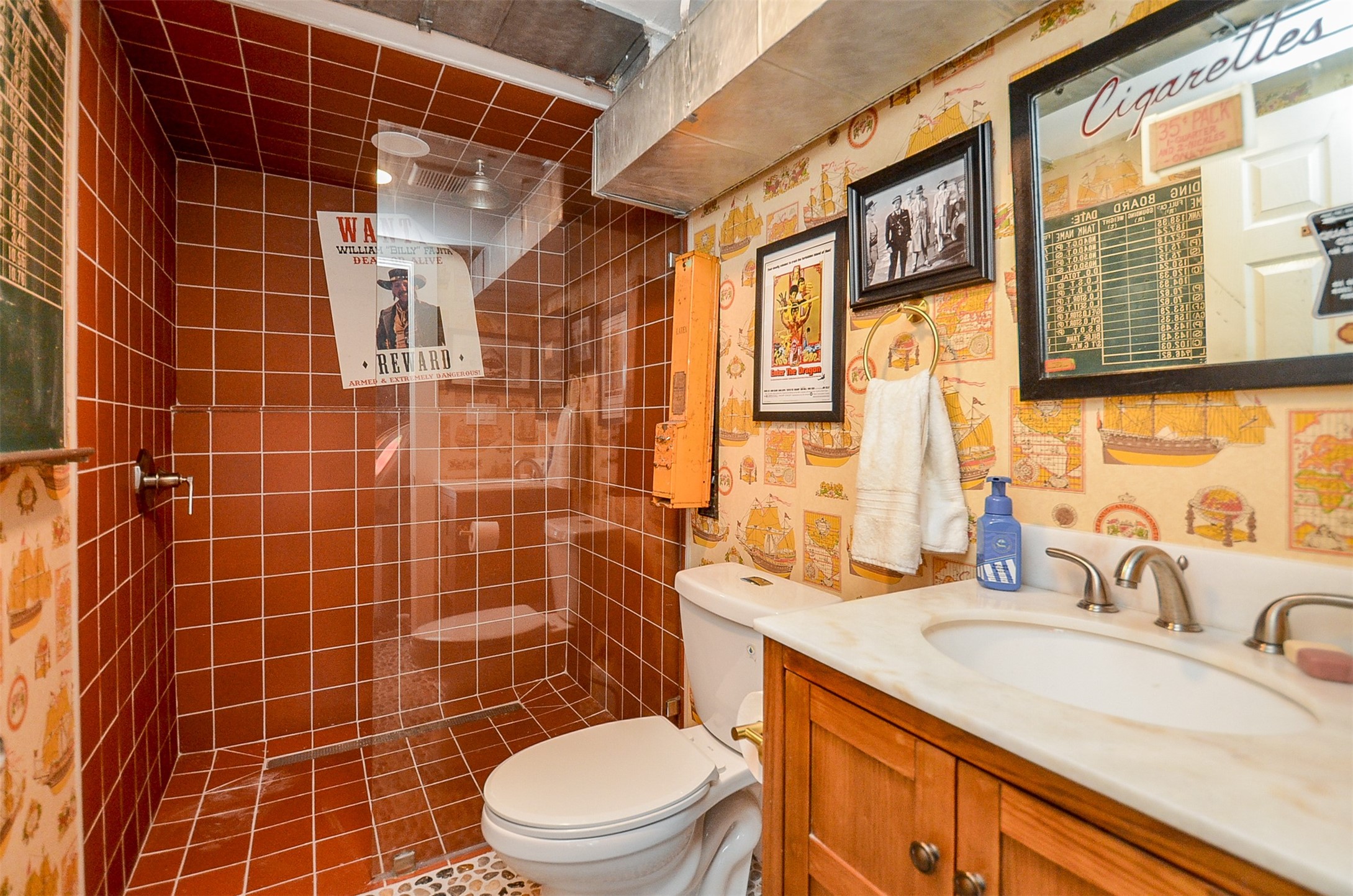 816 West Main Street Houston, TX 77006 - Photo 37 of 48 a bathroom with a sink a toilet and shower