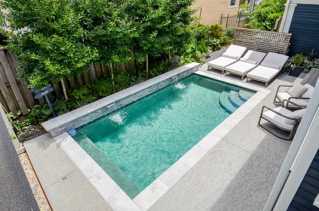 a view from deck with patio
