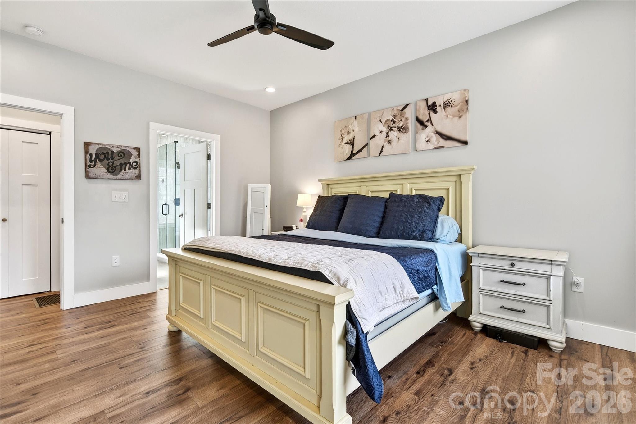 135 Ridge Road Candler, NC 28715 - Photo 14 of 40 a bedroom with a bed and a window