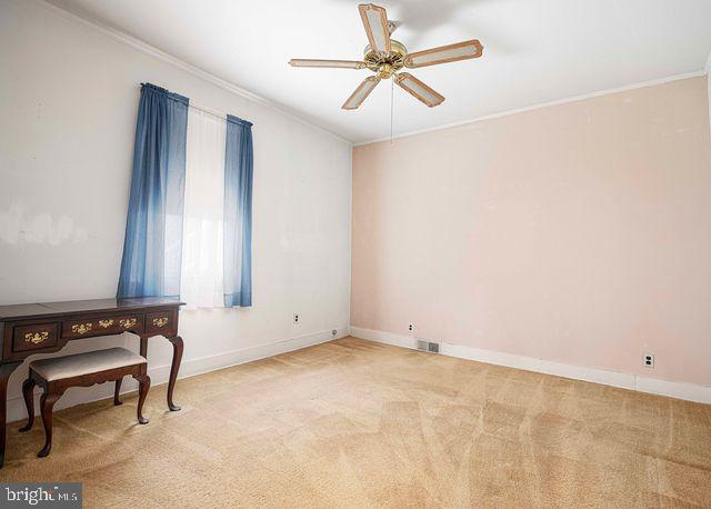 1818 Elk Road Baltimore, MD 21221 - Photo 26 of 45 a view of an empty room with a window