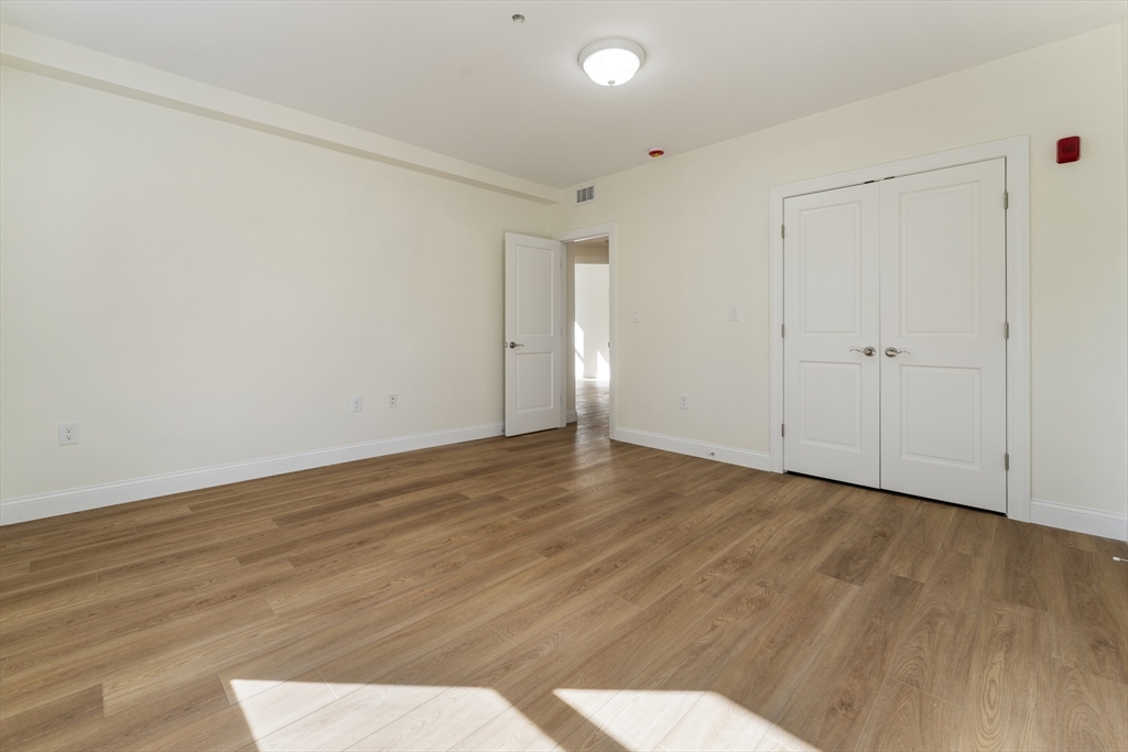 27 Perrin Street, Unit 1 Boston, MA 02119 - Photo 13 of 22 a view of an empty room