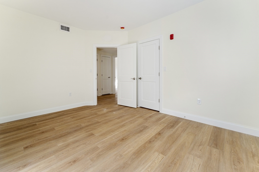 27 Perrin Street, Unit 1 Boston, MA 02119 - Photo 20 of 22 a view of an empty room