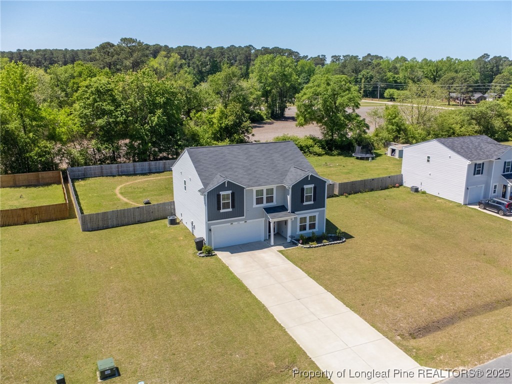 5926 Lowgrass Road Stedman, NC 28391 - Photo 1 of 39 a view of a house with pool and a yard
