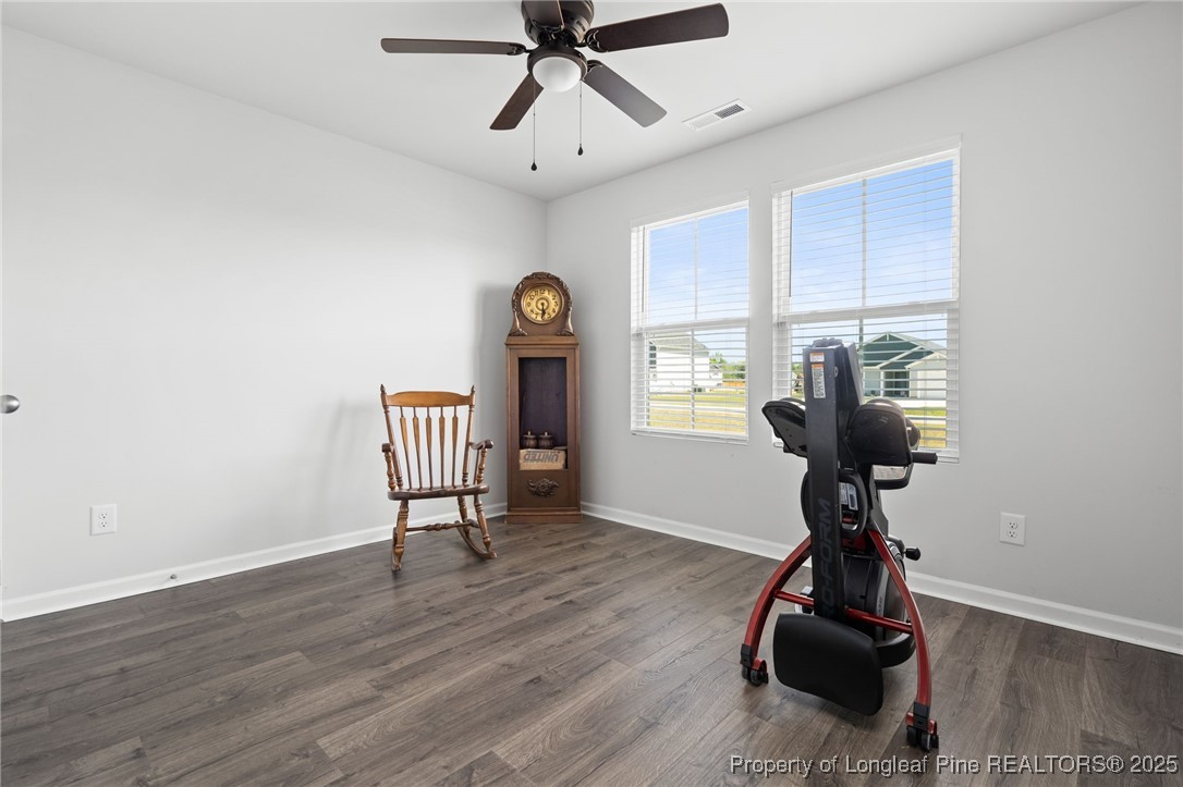 5926 Lowgrass Road Stedman, NC 28391 - Photo 4 of 39 a view of a workspace with furniture and a window