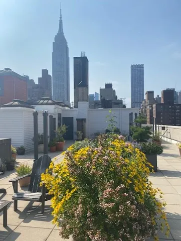 a view of a city with tall buildings