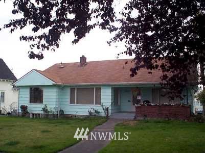 2015 Rucker Avenue Everett, WA 98201 - Photo 1 of 1 a front view of a house with a garden