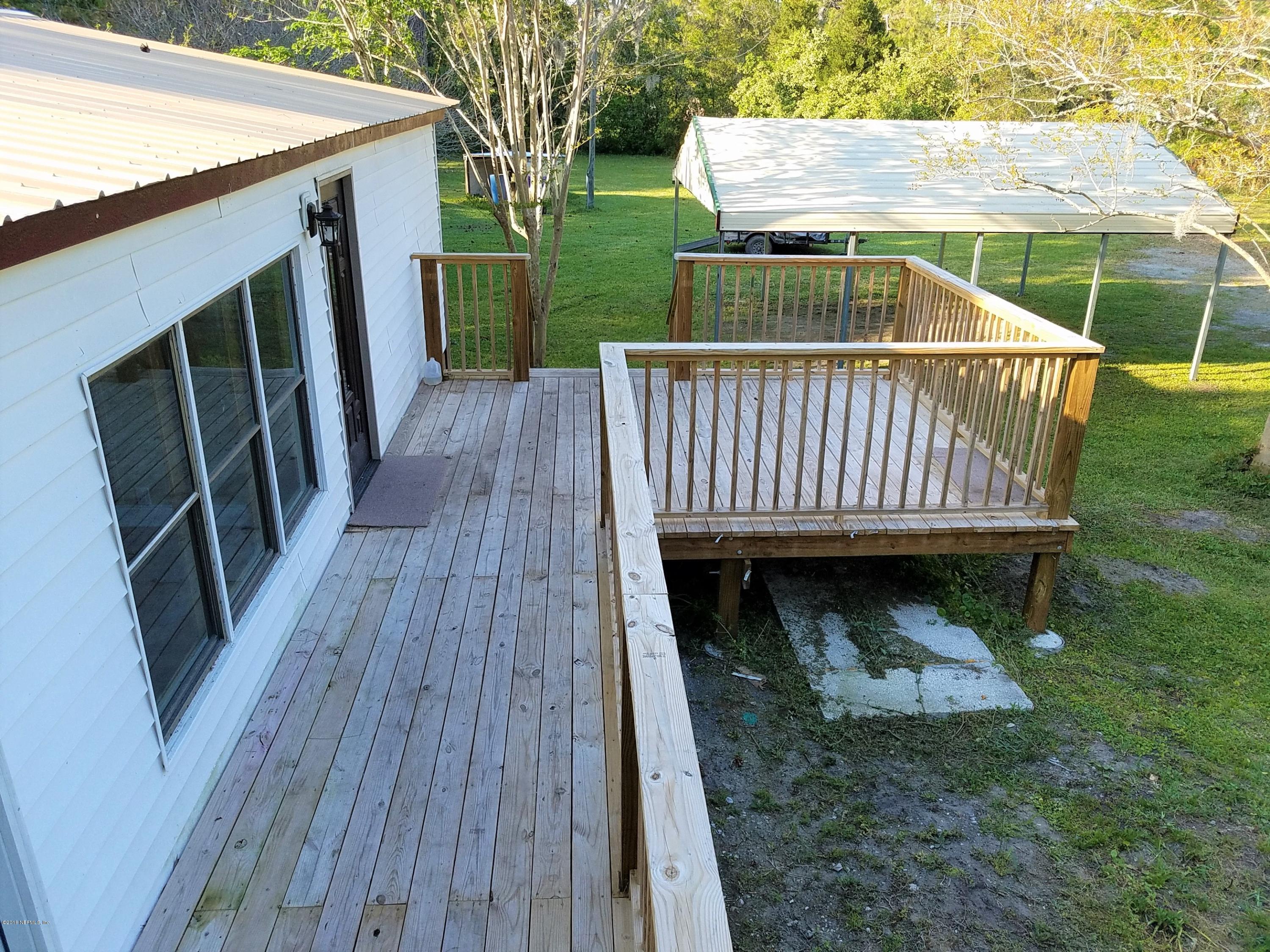 2801 Green Acres Road, Unit EXTENSION St. Augustine, FL 32084 - Photo 20 of 30 a view of deck with patio