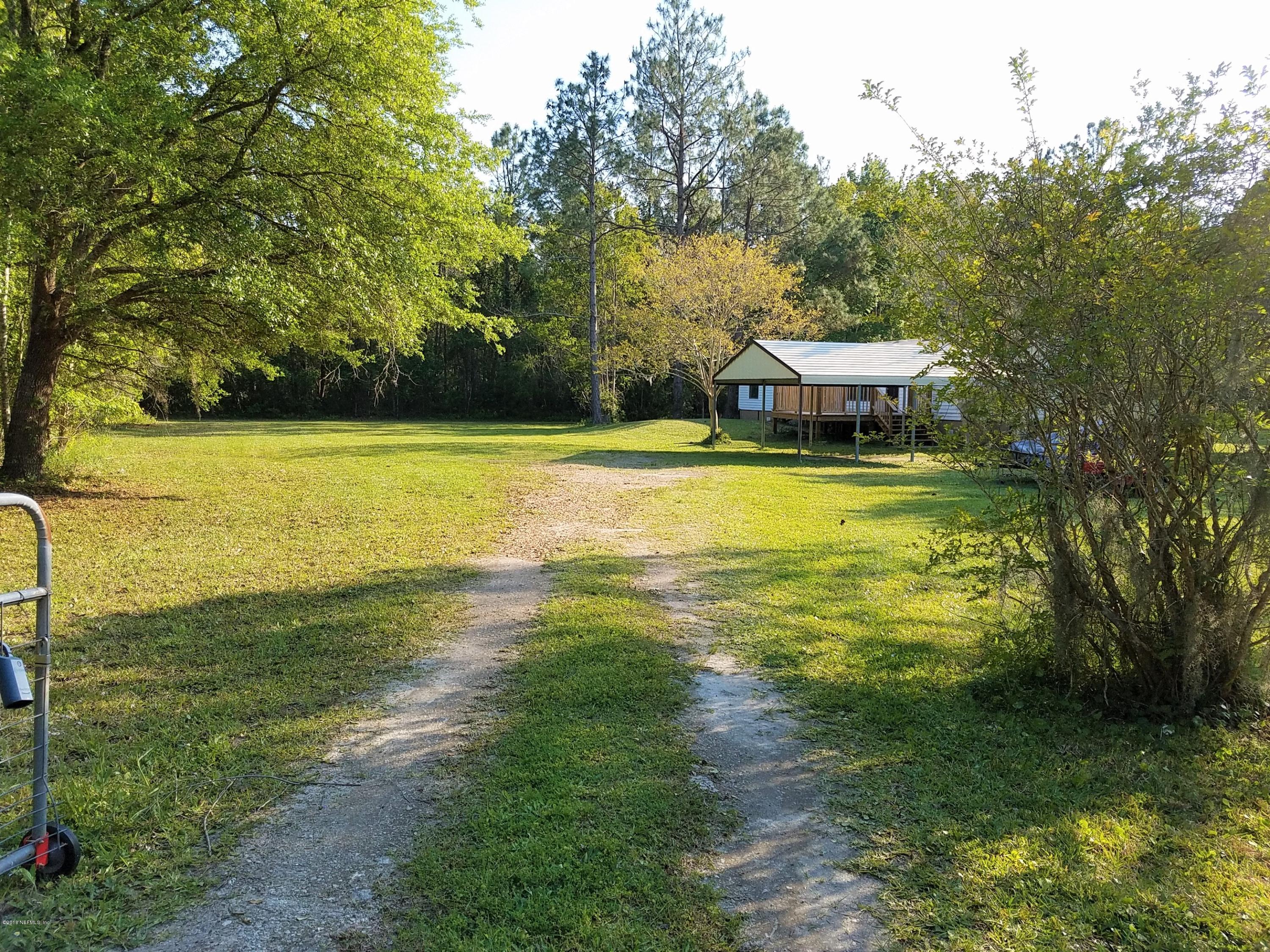 2801 Green Acres Road, Unit EXTENSION St. Augustine, FL 32084 - Photo 30 of 30 a view of an ocean from a yard
