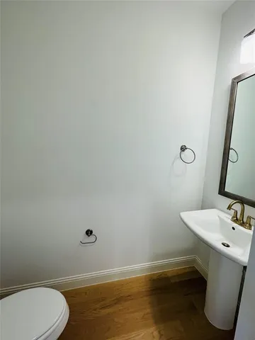 a bathroom with a sink and a toilet