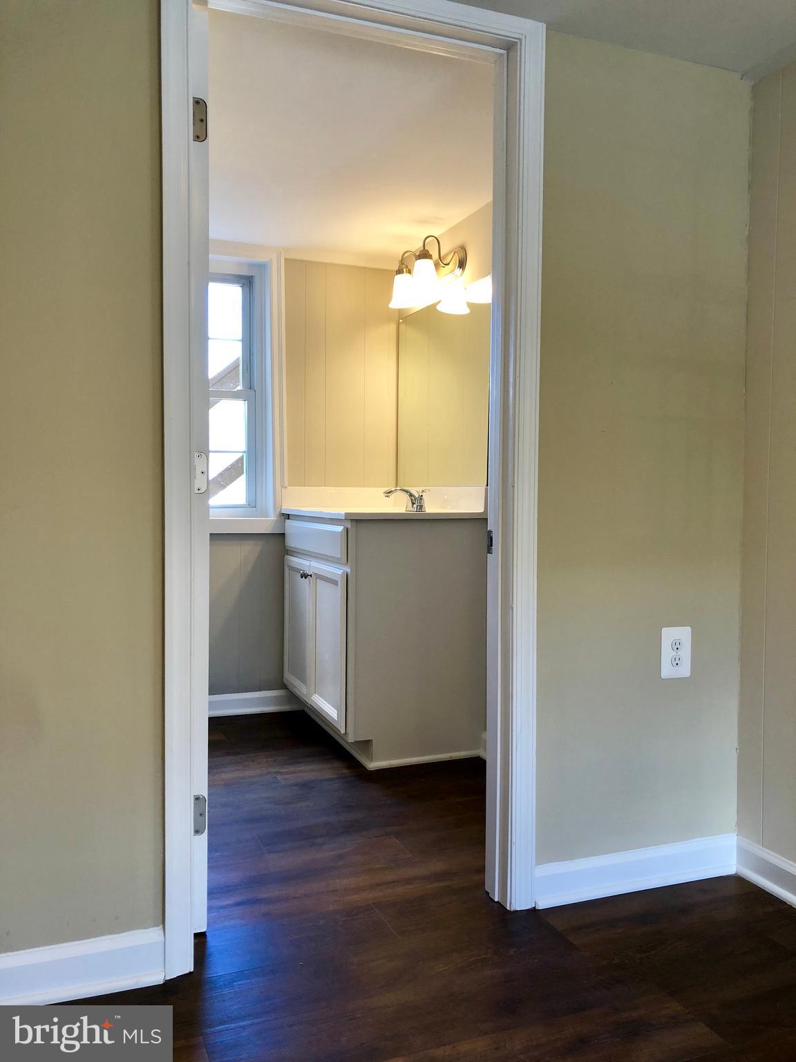 12016 Main Street Libertytown, MD 21762 - Photo 12 of 21 HALL BATH WITH DOUBLE SINKS
