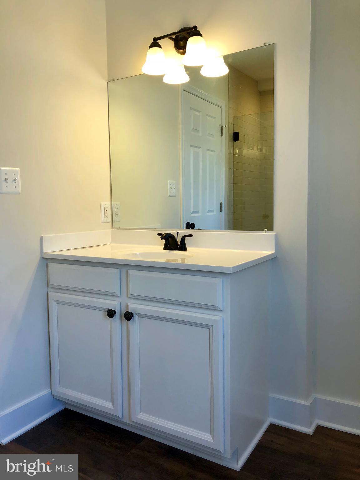 12016 Main Street Libertytown, MD 21762 - Photo 17 of 21 OIL RUBBED BRONZE FIXTURES, NEW VANITIES, TOPS