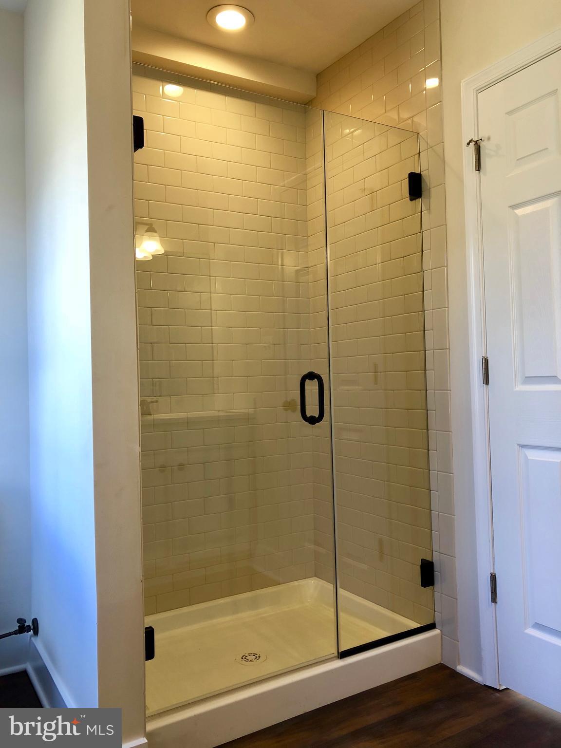 12016 Main Street Libertytown, MD 21762 - Photo 5 of 21 MASTER BATH- CUSTOM SHOWER DOORS, UPGRADE CERAMICS