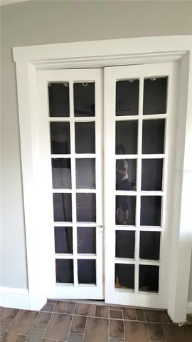 a view of a closet with a large window
