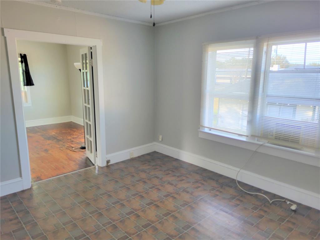 200 Old Daytona Road Deland, FL 32724 - Photo 13 of 23 an empty room with windows and view of bathroom