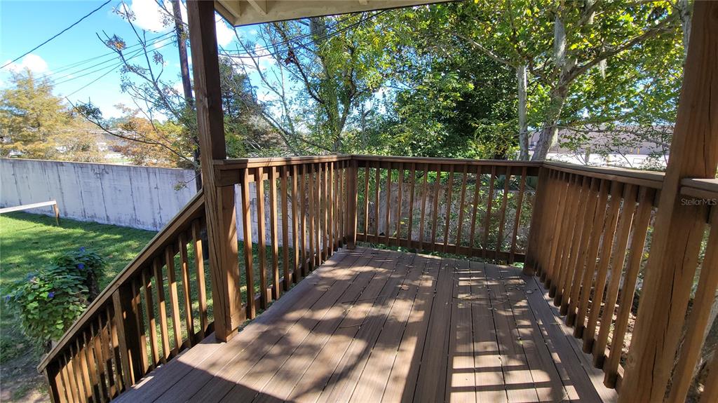 200 Old Daytona Road Deland, FL 32724 - Photo 3 of 23 a view of balcony with wooden floor