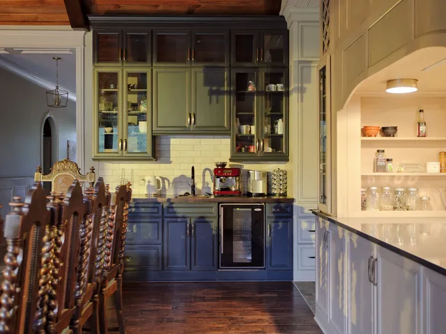 a kitchen with stainless steel appliances granite countertop a stove and a refrigerator