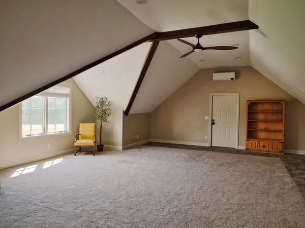 a utility room with cabinets washer and dryer