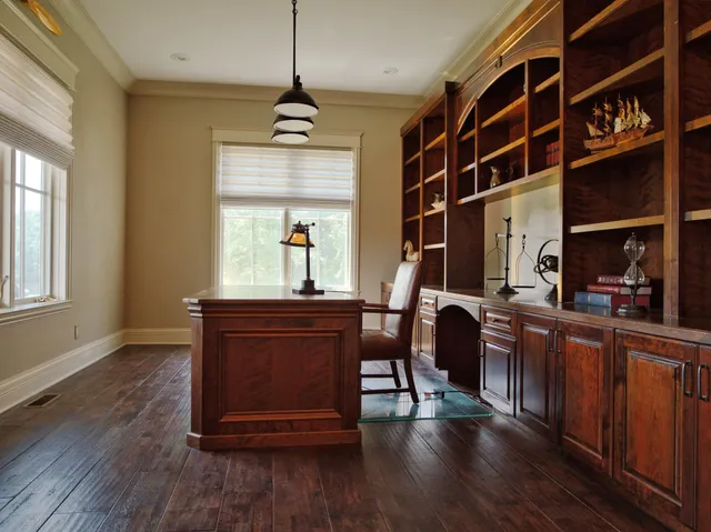 a view of a storage and utility room with washer and dryer