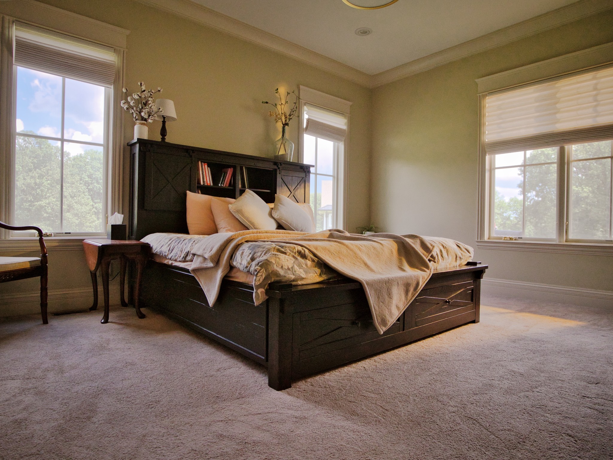 450 Lowe Branch Road Centerville, TN 37033 - Photo 42 of 100 a spacious bedroom with a bed and large windows