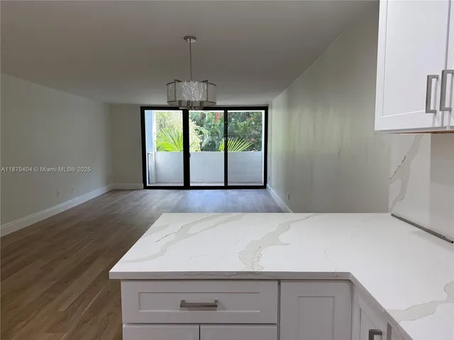 a room with a bed and a window