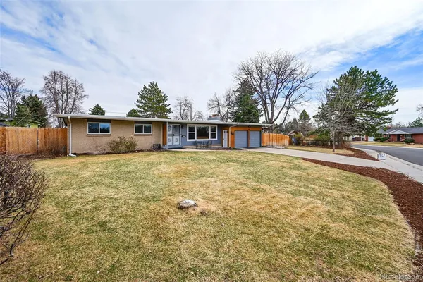 a house view with a garden space