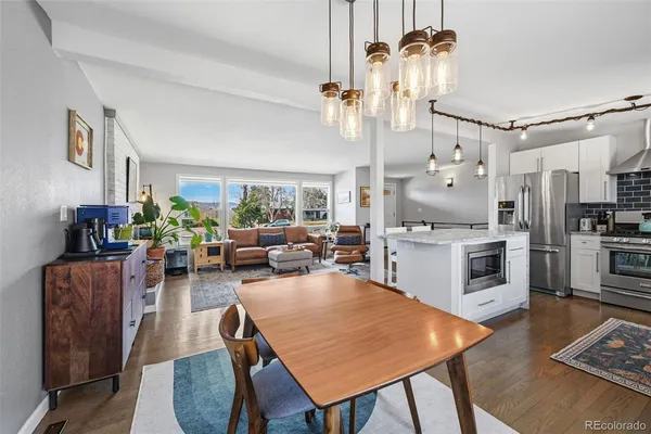 a kitchen with a stove and cabinets