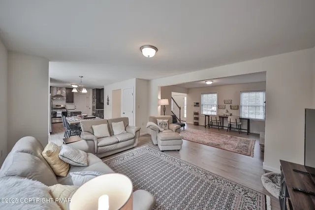 a living room with furniture and a couch