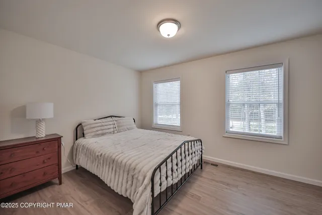 a view of balcony with deck and wooden floor