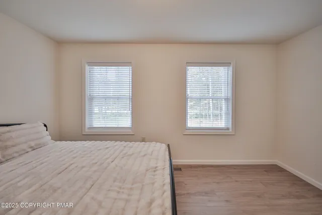 a view of yard with seating area and trees