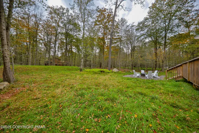 a view of an ocean and a yard