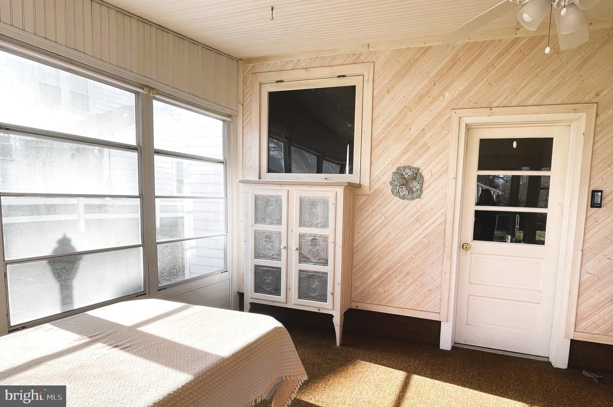 112 North Mill Street Lebanon, PA 17042 - Photo 34 of 48 Enclosed sunroom with pass-through window