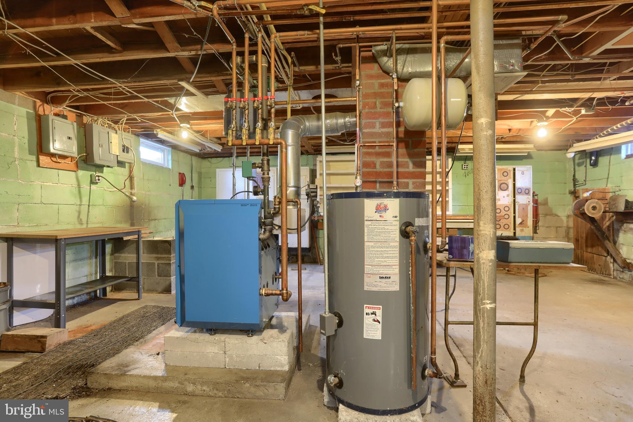 112 North Mill Street Lebanon, PA 17042 - Photo 48 of 48 gas furnace /hot water heater in basement